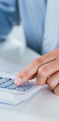 tax-img Hand at keyboard. McCanliss & Early taxation practice.